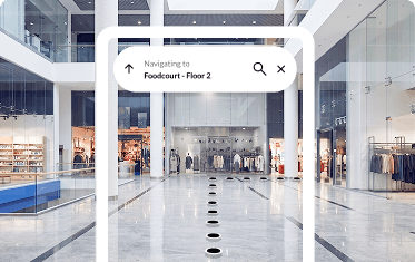 A shopper navigating to the food court on floor 2 after scanning a QR code